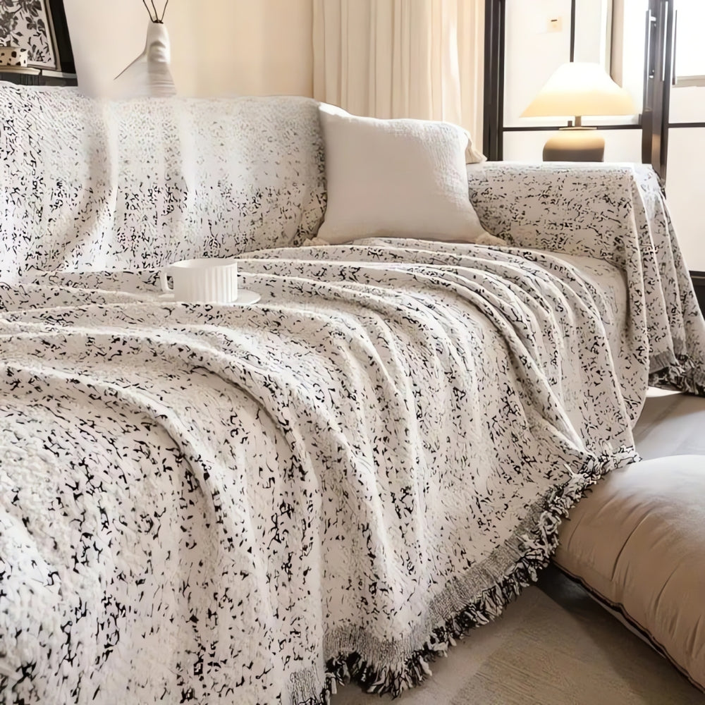 Copertura per divano reversibile a pois nordici